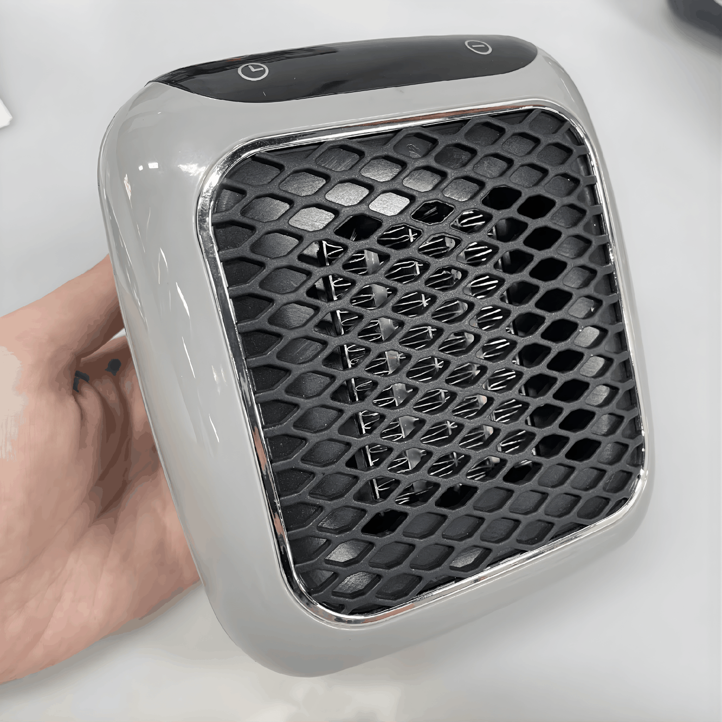 Clutive™ - Mini Plug-In Heater